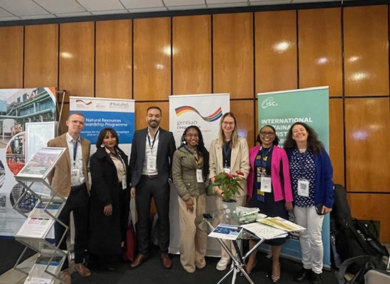 group of people at a booth