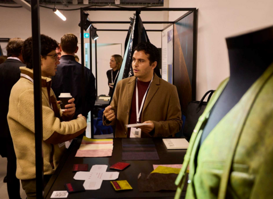 two men talking on a fair